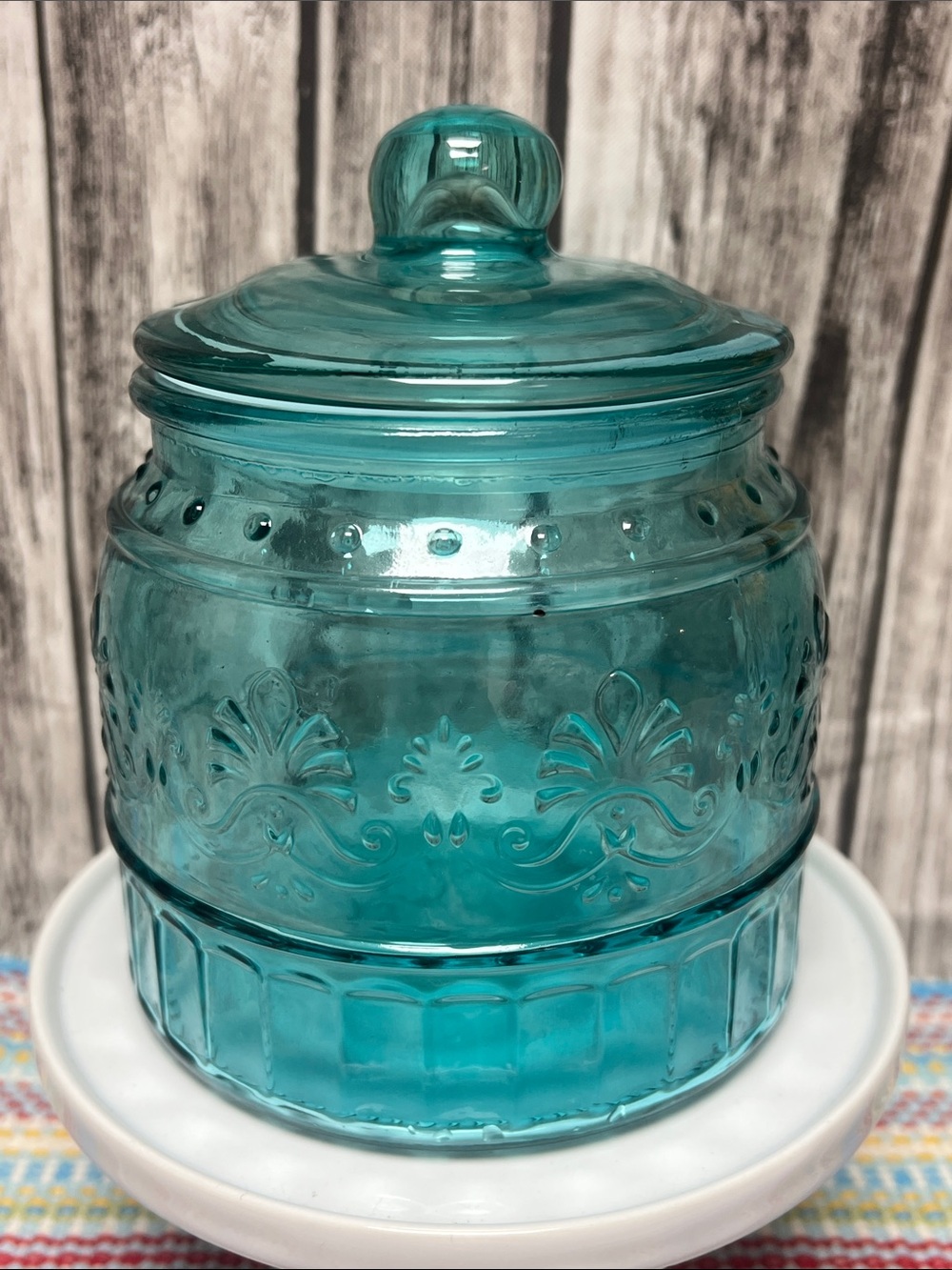 The Pioneer Woman “Cassie” glass embossed canister-small 33oz- 5”x5.75”- Teal